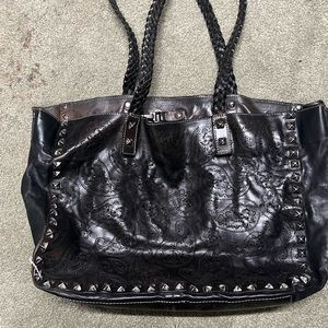 Rock and roll style purse! Much bigger than it seems!